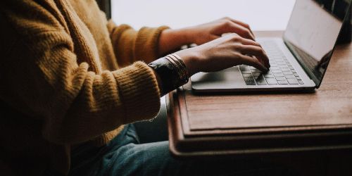 hands on laptop-unsplash