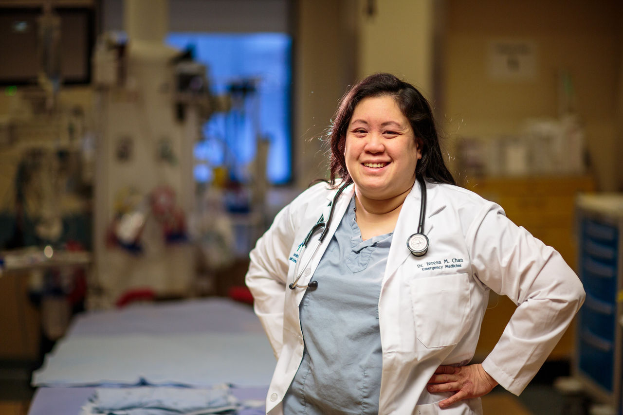 Dr. Teresa Chan in lab coat
